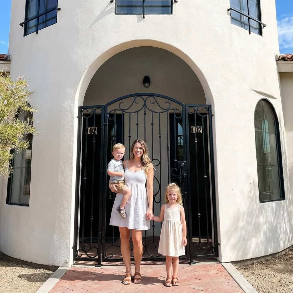 Mom with son and daughter standing in front of the entrance of Soft Shores Pediatric Dentistry in Mesa, AZ